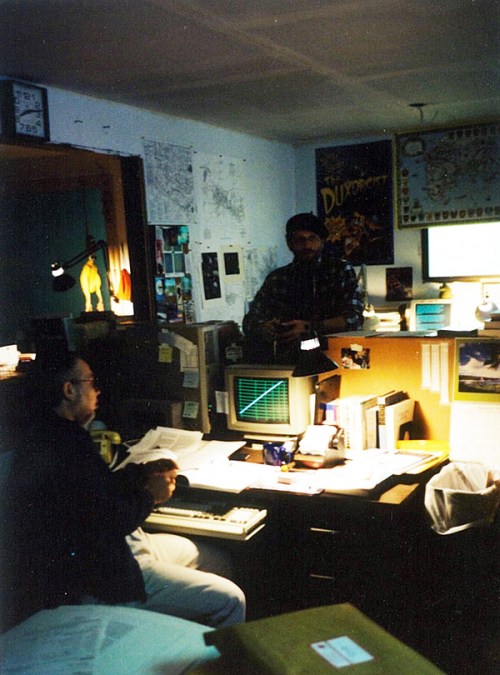 Lynn and Keith at their desks in the comforting gloom of Chaosium, Oakland 1990.