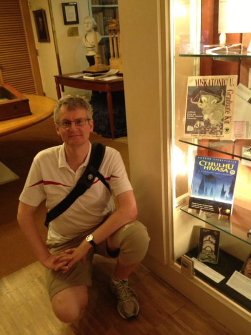 Mark at the Athaneaeum with a Spanish copy of Call of Cthulhu.